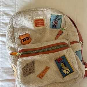 Zootopia Loungefly Disney Cream Bag with Playful Patches